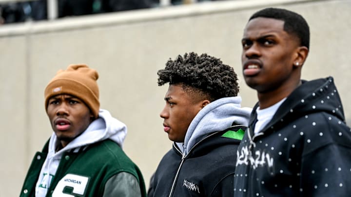 Michigan State basketball players, from left, Tre Holloman, Jeremy Fears and Coen Carr take in the Michigan State basketball players, from left, Tre Holloman, Jeremy Fears and Coen Carr take in the