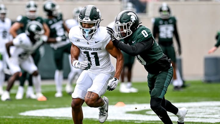 Michigan State's Aziah Johnson, left, and Charles Brantley participate in a drill during the Spring