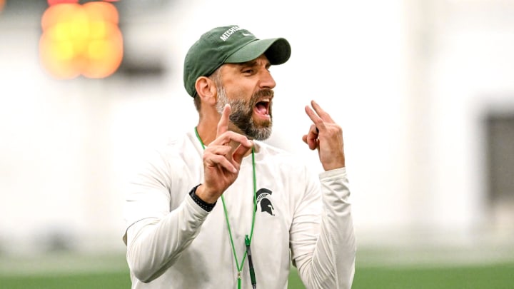 Michigan State's defensive coordinator Joe Rossi gives instructions while working with linebackers during camp on Monday, Aug. 5, 2024, at the indoor practice facility in East Lansing.