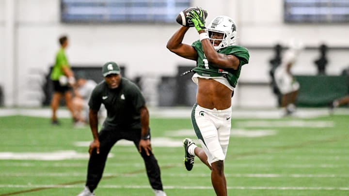 Michigan State's Antonio Gates Jr. catches a pass during camp on Monday, Aug. 5, 2024, at the indoor practice facility in East Lansing.