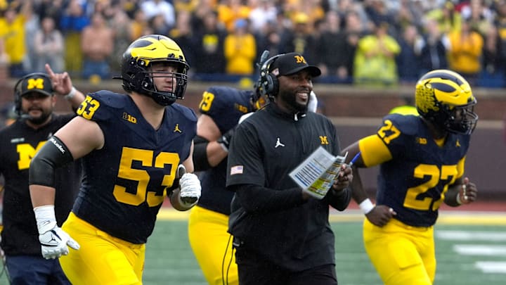 Michigan football coach Sherrone Moore celebrates a play during first-half action between Michigan and Minnesota at Michigan Stadium in Ann Arbor on Saturday, Sept. 28, 2024.
