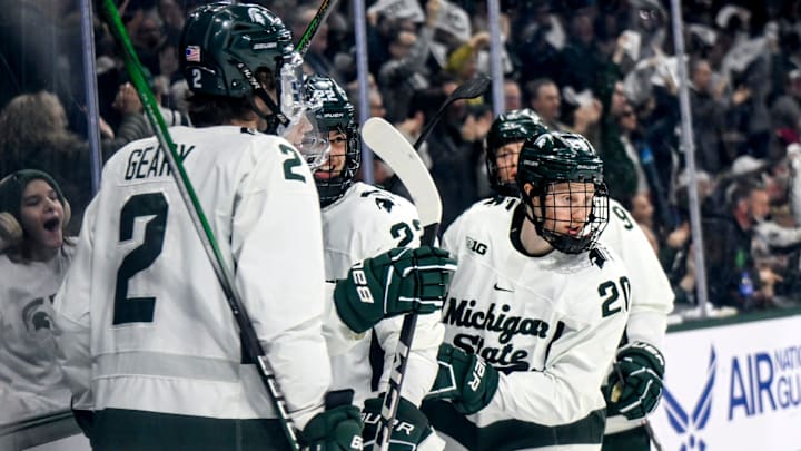 Michigan State's Daniel Russell, right, celebrates his goal against Ohio State in the second period of the Big Ten tournament game on Saturday, March 16, 2024, at Munn Arena in East Lansing.