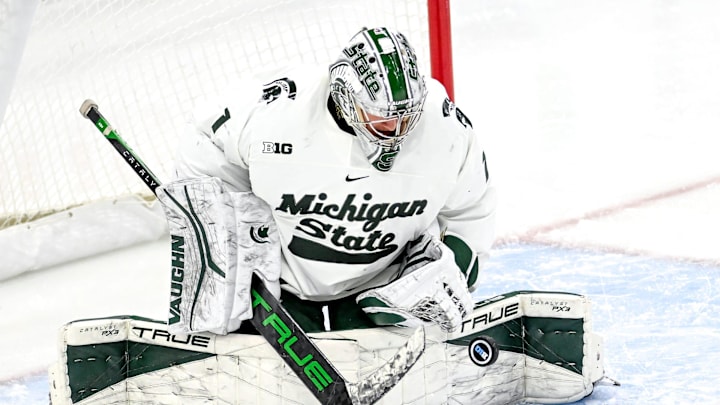 Michigan State's goalie Trey Augustine makes a stop in the first period of the Big Ten tournament game against Ohio State on Saturday, March 16, 2024, at Munn Arena in East Lansing.