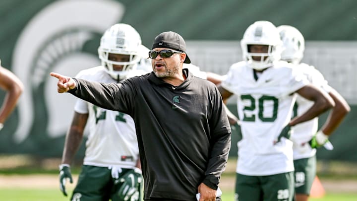 Michigan State's cornerbacks coach Demetrice Martin works with players during the first day of football camp on Tuesday, July 30, 2024, in East Lansing. Michigan State's cornerbacks coach Demetrice Martin works with players during the first day of football camp on Tuesday, July 30, 2024, in East Lansing.