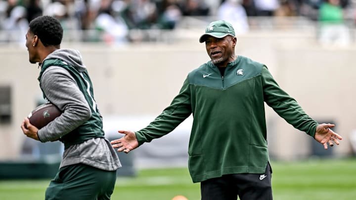 Michigan State's Michigan State's wide receivers coach Courtney Hawkins, right, talks with Jaden Mangham during the Spring Showcase on Saturday, April 20, 2024, at Spartan Stadium in East Lansing.