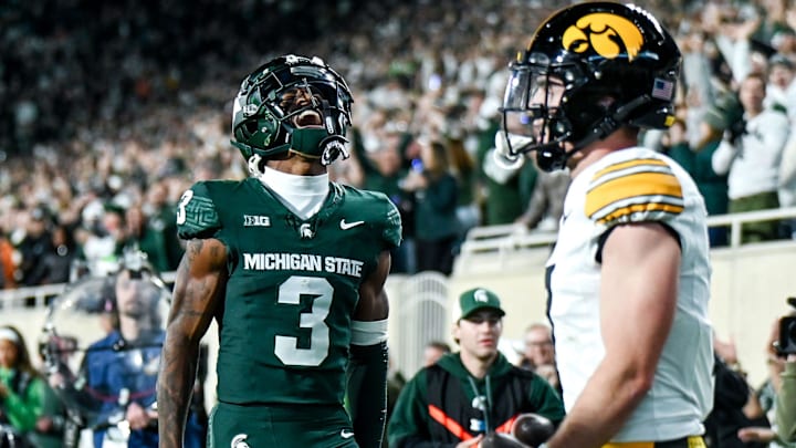 Michigan State's Montorie Foster Jr., left, celebrates his touchdown catch against Iowa during the third quarter on Saturday, Oct. 19, 2024, at Spartan Stadium in East Lansing.