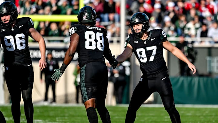 Michigan State's Jonathan Kim, right, celebrates his field goal with Tyneil Hopper during the first quarter in the game against Indiana on Saturday, Nov. 2, 2024, at Spartan Stadium in East Lansing. Michigan State's Jonathan Kim, right, celebrates his field goal with Tyneil Hopper during the first quarter in the game against Indiana on Saturday, Nov. 2, 2024, at Spartan Stadium in East Lansing.