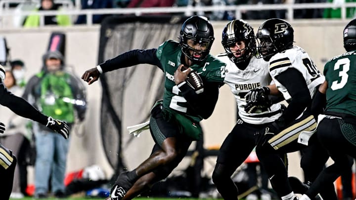 Michigan State's Aidan Chiles runs for a gain against Purdue during the first quarter on Friday, Nov. 22, 2024, at Spartan Stadium in East Lansing. Michigan State's Aidan Chiles runs for a gain against Purdue during the first quarter on Friday, Nov. 22, 2024, at Spartan Stadium in East Lansing.