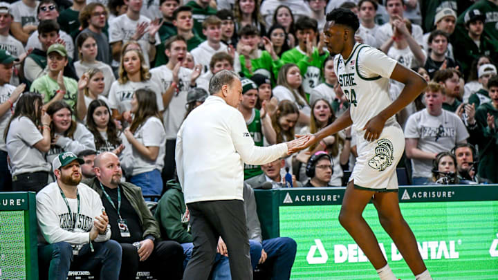Michigan State's head coach Tom Izzo, left, slaps hands with Xavier Booker after some quality minutes against Penn State during the second half on Wednesday, Jan. 15, 2025, at the Breslin Center in East Lansing.