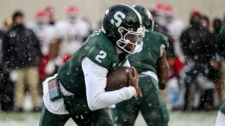 Michigan State's Aidan Chiles runs the ball against Rutgers during the first quarter on Saturday, Nov. 30, 2024, at Spartan Stadium in East Lansing. Michigan State's Aidan Chiles runs the ball against Rutgers during the first quarter on Saturday, Nov. 30, 2024, at Spartan Stadium in East Lansing.