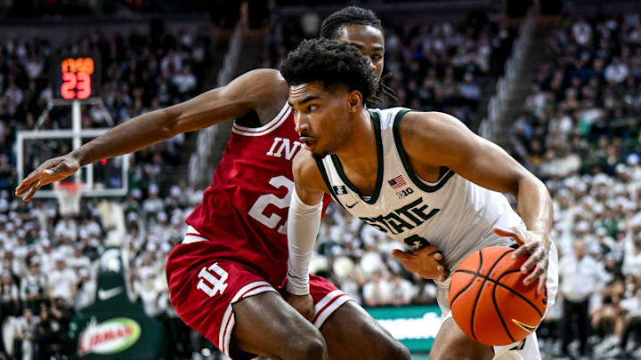 Michigan State's Jaden Akins, right, moves the ball as Indiana's Mackenzie Mgbako defends during the first half on Tuesday, Feb. 11, 2025, at the Breslin Center in East Lansing. Michigan State's Jaden Akins, right, moves the ball as Indiana's Mackenzie Mgbako defends during the first half on Tuesday, Feb. 11, 2025, at the Breslin Center in East Lansing.