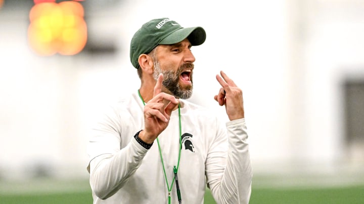 Michigan State's defensive coordinator Joe Rossi gives instructions while working with linebackers during camp on Monday, Aug. 5, 2024, at the indoor practice facility in East Lansing.