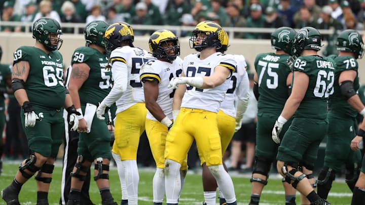 Michigan Wolverines defensive end Aidan Hutchinson (97) celebrates his sack vs. the Michigan State Spartans during the first half Saturday, Oct. 30, 2021.

Msu Mich