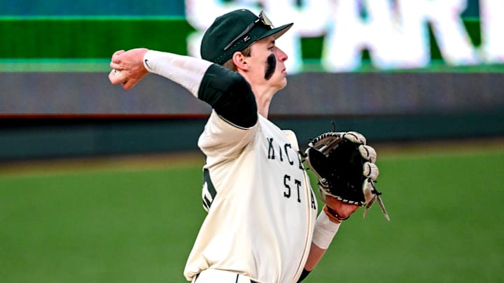 Michigan State's Randy Seymour fields a ball hit by the Lugnuts in the first inning on Tuesday, April 1, 2025, during the Crosstown Showdown at Jackson Field in Lansing.