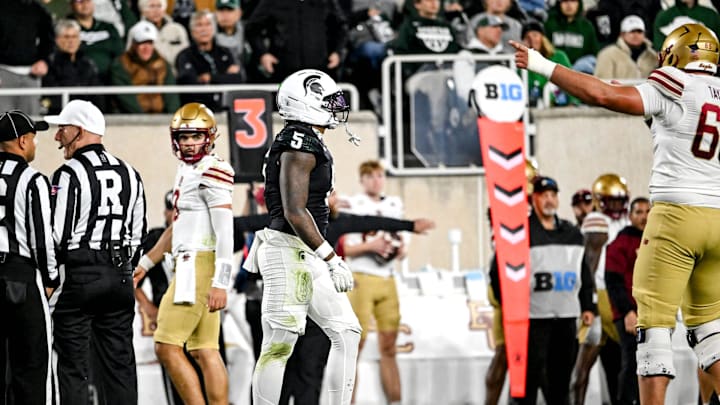 Michigan State's Jordan Hall walks past a flag after being called for roughing the passer against Boston College during the second quarter on Saturday, Sept. 6, 2025, at Spartan Stadium in East Lansing.