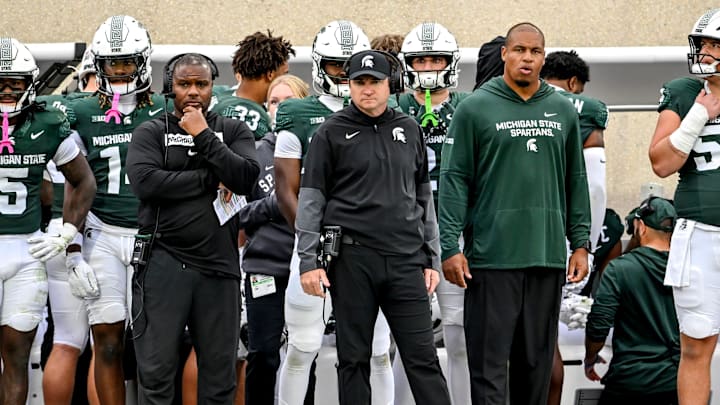 Michigan State's head coach Jonathan Smith, center, looks on from the sideline during the third quarter in the game against UCLA on Saturday, Oct. 11, 2025, at Spartan Stadium in East Lansing. Michigan State's head coach Jonathan Smith, center, looks on from the sideline during the third quarter in the game against UCLA on Saturday, Oct. 11, 2025, at Spartan Stadium in East Lansing.