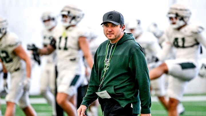 Michigan State football head coach Jonathan Smith looks on during practice on Tuesday, April 8, 2025, in East Lansing. Michigan State football head coach Jonathan Smith looks on during practice on Tuesday, April 8, 2025, in East Lansing.