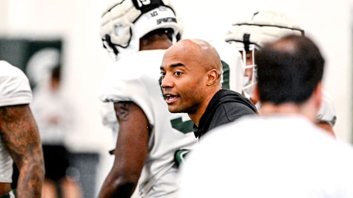 Michigan State safeties coach James Adams works with players during football practice on Tuesday, April 8, 2025, in East Lansing.