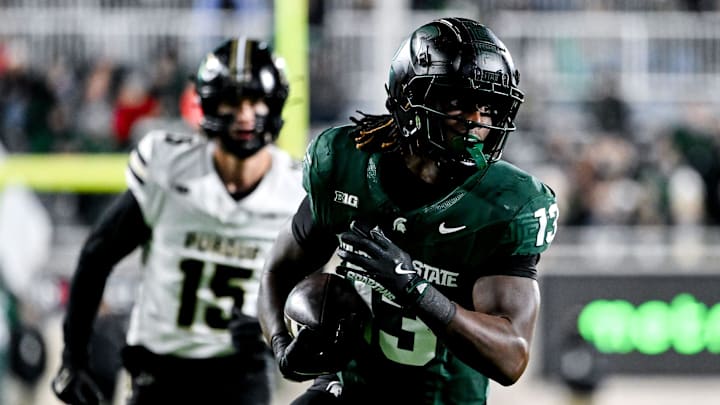 Michigan State's Ademola Faleye runs after a catch against Purdue during the first quarter on Friday, Nov. 22, 2024, at Spartan Stadium in East Lansing. Michigan State's Ademola Faleye runs after a catch against Purdue during the first quarter on Friday, Nov. 22, 2024, at Spartan Stadium in East Lansing.