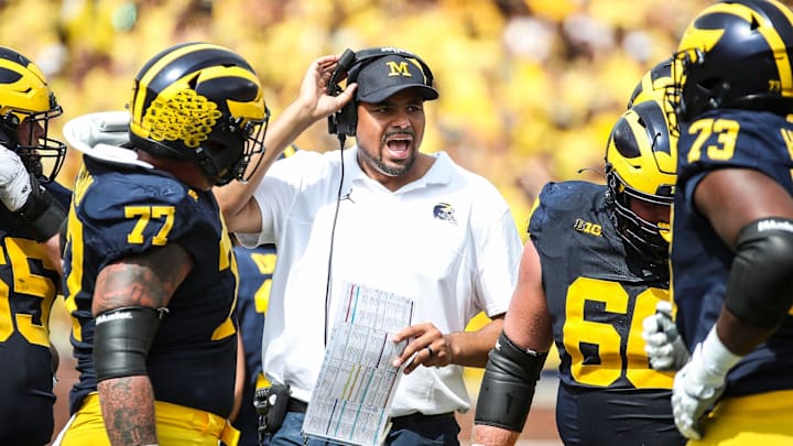 Michigan tight ends coach Grant Newsome talks to players at a timeout during the second half of U-M's 30-3 win on Saturday, Sept. 2, 2023, at Michigan Stadium.