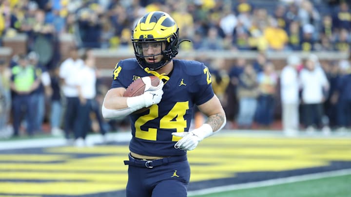 Michigan Wolverines running back Cole Cabana (24) warms up before action against the Bowling Green Falcons Saturday, Sept.16 2023. Michigan Wolverines running back Cole Cabana (24) warms up before action against the Bowling Green Falcons Saturday, Sept.16 2023.