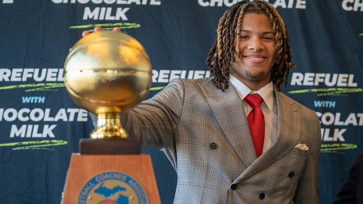 Trey McKenney, a five-star guard of Orchard Lake St. Mary’s, is the 2025 45th annual Hal Schram Mr. Basketball award winner on Monday, March 10, 2025. McKenney accepts his award at the Detroit Free Press in Detroit.
