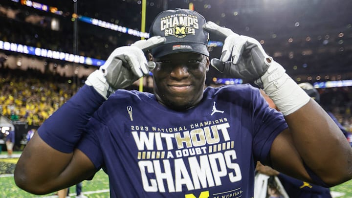 A Michigan football player celebrates the 34-13 win over Washington to win the national championship game at NRG Stadium in Houston on Monday, Jan. 8, 2024. A Michigan football player celebrates the 34-13 win over Washington to win the national championship game at NRG Stadium in Houston on Monday, Jan. 8, 2024.