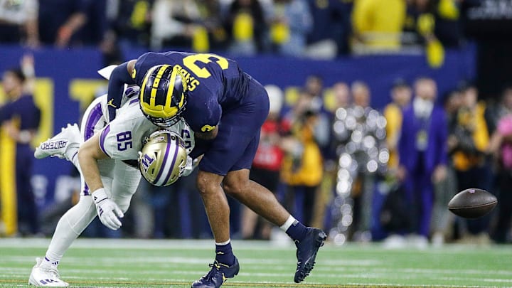 Michigan defensive back Keon Sabb tackles Washington tight end Josh Cuevas during the second half of U-M's 34-13 win in the College Football Playoff national championship game