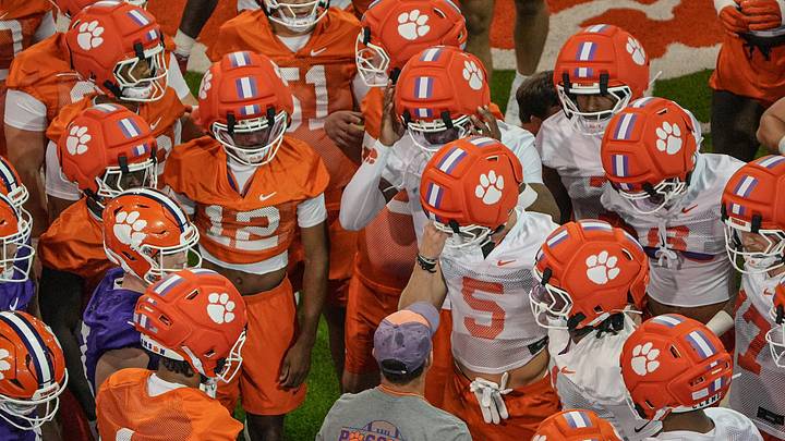 Clemson head coach Dabo Swinney talks with players before going outside during practice in the at the Allen N. Reeves Sports Complex in Clemson, S.C. Friday, August 7, 2026. Clemson head coach Dabo Swinney talks with players before going outside during practice in the at the Allen N. Reeves Sports Complex in Clemson, S.C. Friday, August 7, 2026.
