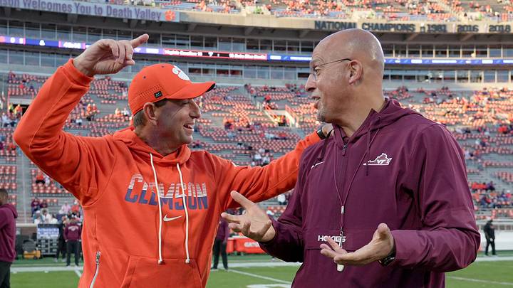 Clemson head coach Dabo Swinney and Virginia Tech Hokies Head Coach James Franklin greet each other with lively conversation during warm up time before kickoff with Clemson and Virginia Tech at Memorial Stadium in Clemson, S.C. Saturday, Oct 24, 2026. Clemson head coach Dabo Swinney and Virginia Tech Hokies Head Coach James Franklin greet each other with lively conversation during warm up time before kickoff with Clemson and Virginia Tech at Memorial Stadium in Clemson, S.C. Saturday, Oct 24, 2026.