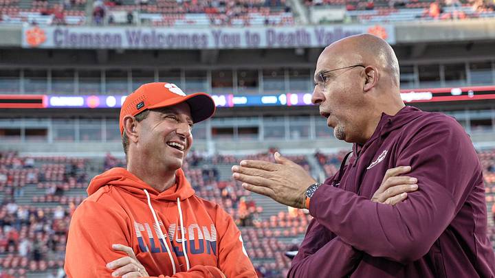 Clemson head coach Dabo Swinney and Virginia Tech Hokies Head Coach James Franklin greet each other with lively conversation during warm up time before kickoff with Clemson and Virginia Tech at Memorial Stadium in Clemson, S.C. Saturday, Oct 24, 2026. Clemson head coach Dabo Swinney and Virginia Tech Hokies Head Coach James Franklin greet each other with lively conversation during warm up time before kickoff with Clemson and Virginia Tech at Memorial Stadium in Clemson, S.C. Saturday, Oct 24, 2026.