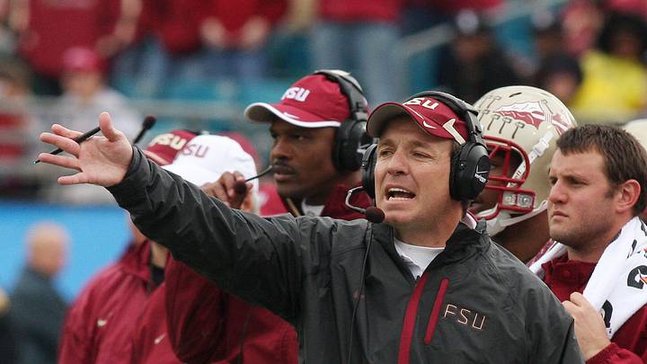 KELLY JORDAN/The Times-Union--010110--Jimbo Fisher calls plays from the sidelines during the FSU game against West Virginia at Jacksonville Municipal Stadium for the Gator Bowl Friday January 1, 2010.