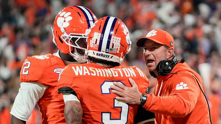 Clemson head coach Dabo Swinney pats corner back Elliot Washington II (3) after he defended Virginia Tech Hokies wide receiver Ayden Greene (0) during the fourth quarter at Memorial Stadium Saturday, October 24, 2026. Washington was called for pass interference on the play late in the game. Clemson head coach Dabo Swinney pats corner back Elliot Washington II (3) after he defended Virginia Tech Hokies wide receiver Ayden Greene (0) during the fourth quarter at Memorial Stadium Saturday, October 24, 2026. Washington was called for pass interference on the play late in the game.