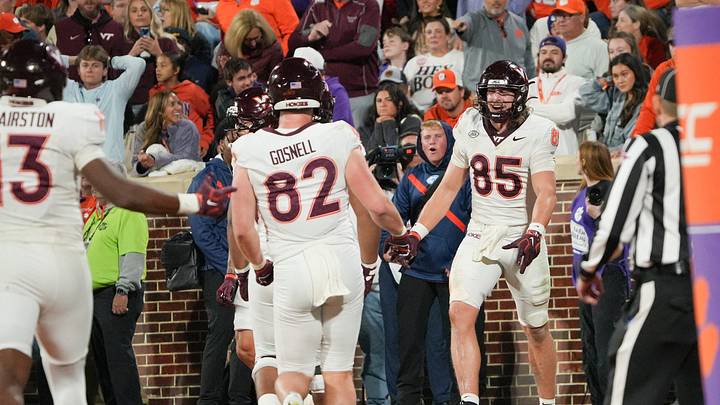 Virginia Tech Hokies tight end Luke Reynolds (85) scores near Clemson safety Jerome Carter III (6) during the second quarter at Memorial Stadium Saturday, October 24, 2026.