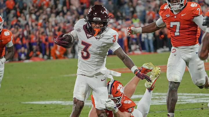 Virginia Tech wide receiver Que'Sean Brown (3) runs while Clemson linebacker Sammy Brown (47) pursues. Virginia Tech wide receiver Que'Sean Brown (3) runs while Clemson linebacker Sammy Brown (47) pursues.