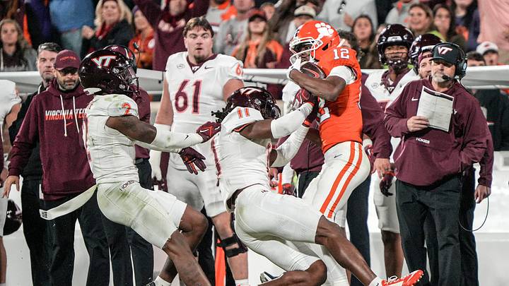 Clemson wide receiver Bryant Wesco Jr. (12) catches a pass near Virginia Tech cornerback Jaquez White (2) and safety DQ Smith (11)/ Referees ruled he did not maintain possession of the ball going out of bounds. Clemson wide receiver Bryant Wesco Jr. (12) catches a pass near Virginia Tech cornerback Jaquez White (2) and safety DQ Smith (11)/ Referees ruled he did not maintain possession of the ball going out of bounds.