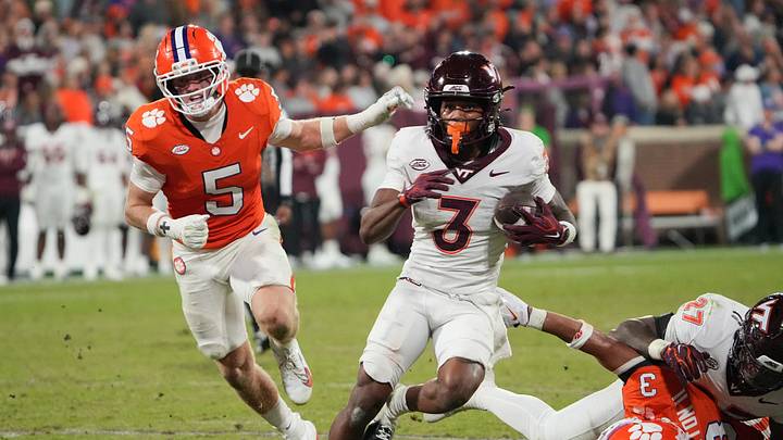 Virginia Tech Hokies wide receiver Que'Sean Brown (3) runs by Clemson safety Ronan Hanafin (5) during the fourth quarter at Memorial Stadium Saturday, October 24, 2026. Virginia Tech Hokies wide receiver Que'Sean Brown (3) runs by Clemson safety Ronan Hanafin (5) during the fourth quarter at Memorial Stadium Saturday, October 24, 2026.