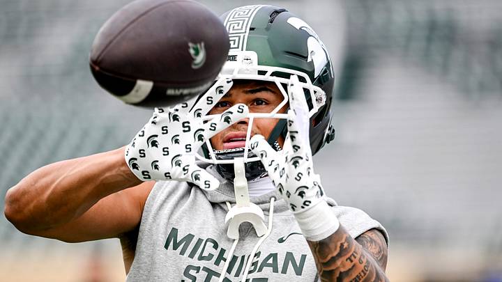 Michigan State's Evan Boyd catches a pass while warming up before the game against Youngstown State on Saturday, Sept. 13, 2025, at Spartan Stadium in East Lansing. Michigan State's Evan Boyd catches a pass while warming up before the game against Youngstown State on Saturday, Sept. 13, 2025, at Spartan Stadium in East Lansing.