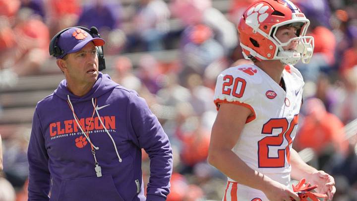 Clemson head coach Dabo Swinney and receiver Clark Sanderson (20) during the first half at the annnual Clemson Orange and White spring game at Memorial Stadium in Clemson, South Carolina Saturday, March 28, 2026. Clemson head coach Dabo Swinney and receiver Clark Sanderson (20) during the first half at the annnual Clemson Orange and White spring game at Memorial Stadium in Clemson, South Carolina Saturday, March 28, 2026.