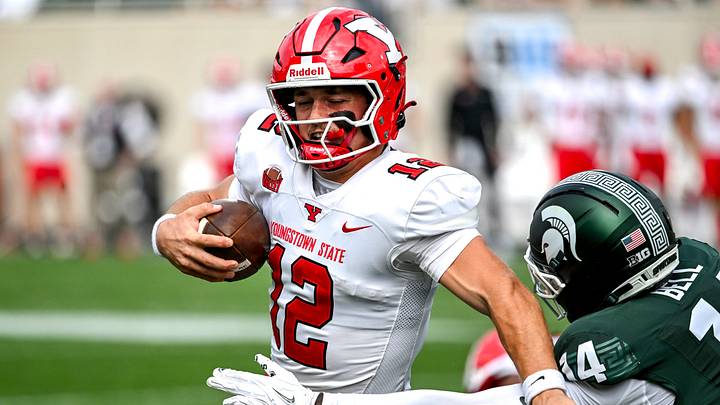 Michigan State's Malcolm Bell, right, tackles Youngstown State's quarterback Beau Brungard during the first quarter on Saturday, Sept. 13, 2025, at Spartan Stadium in East Lansing. Michigan State's Malcolm Bell, right, tackles Youngstown State's quarterback Beau Brungard during the first quarter on Saturday, Sept. 13, 2025, at Spartan Stadium in East Lansing.