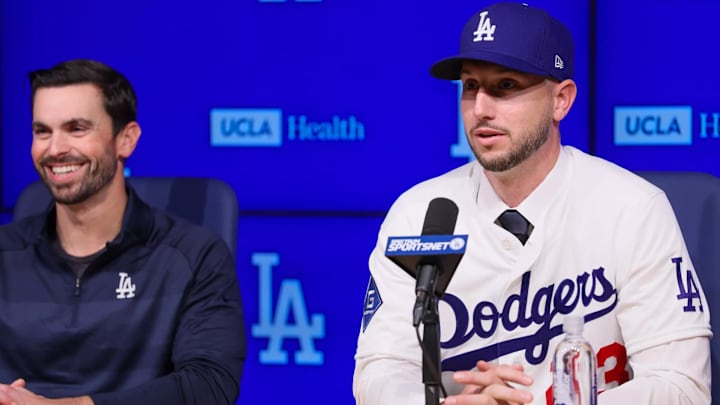 Los Angeles Dodgers general manager Brandon Gomes (left) with Kyle Tucker (right) during an introductory press conference at Dodger Stadium on Wednesday, Jan. 21, 2026.