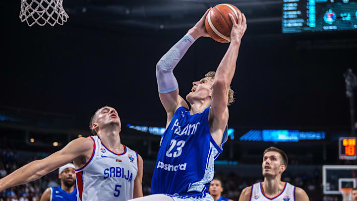Lauri Markkanen drives to the rim in Finland vs. Serbia.