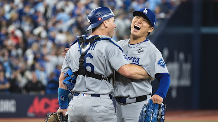 Dodgers catcher Will Smith and pitcher Yoshinobu Yamamoto celebrate the final out of Game 7 of the 2025 World Series.