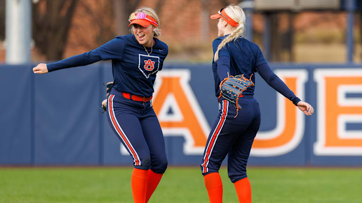 The Auburn softball team opened the new year practicing outside. The Auburn softball team opened the new year practicing outside.