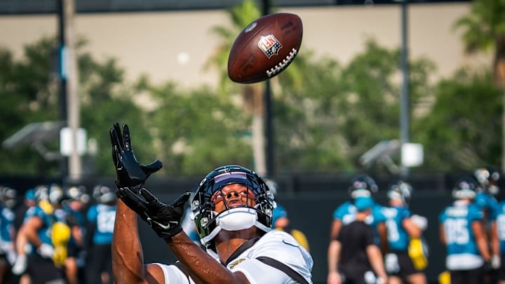 Jacksonville Jaguars cornerback Caleb Ransaw (27) hauls in a pass while running routes during the seventh organized team activity at the Miller Electric Center in Jacksonville, Fla. Monday, June 2, 2025. [Doug Engle/Florida Times-Union]