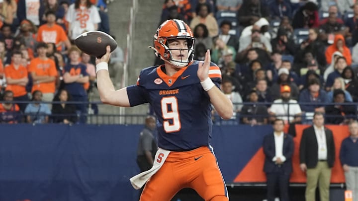Sep 6, 2025; Syracuse, New York, USA; Syracuse Orange quarterback Steve Angeli (9) throws against the UConn Huskies during the second half at JMA Wireless Dome. Mandatory Credit: Gregory Fisher-Imagn Images