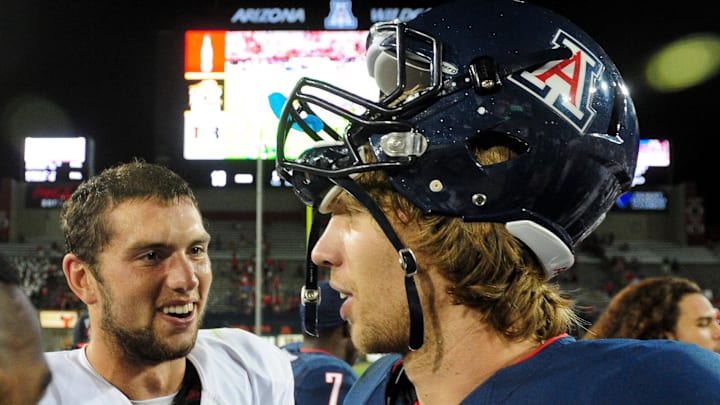 Sept. 17, 2011; Tucson, AZ, USA; Stanford Cardinal quarterback Andrew Luck (12) and Arizona Wildcats quarterback Nick Foles (8) talk after the game at Arizona Stadium. Stanford won 37-10. Mandatory Credit: Matt Kartozian-Imagn Images Sept. 17, 2011; Tucson, AZ, USA; Stanford Cardinal quarterback Andrew Luck (12) and Arizona Wildcats quarterback Nick Foles (8) talk after the game at Arizona Stadium. Stanford won 37-10. Mandatory Credit: Matt Kartozian-Imagn Images