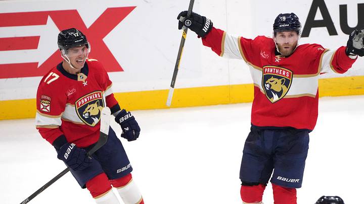 Dec 6, 2025; Sunrise, Florida, USA;  Florida Panthers center Sam Bennett (9) celebrates the winning goal in overtime against the Columbus Blue Jackets with left wing Brad Marchand (63) and center Evan Rodrigues (17) at Amerant Bank Arena. Mandatory Credit: Jim Rassol-Imagn Images