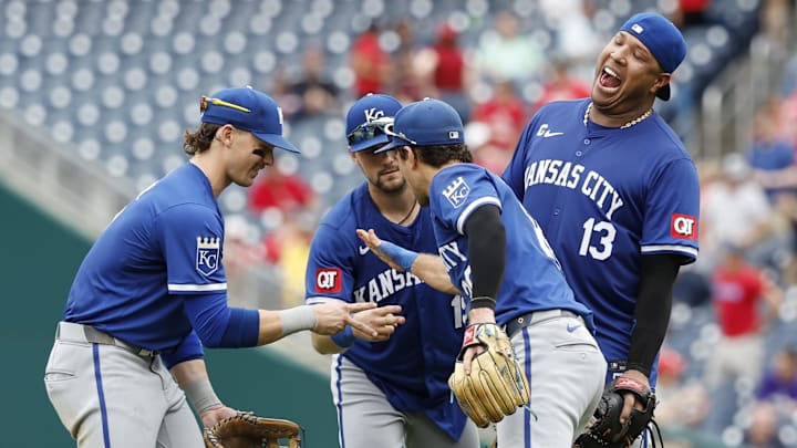 Sep 26, 2024; Washington, District of Columbia, USA; (L-R) Kansas City Royals shortstop Bobby Witt Jr. (7), Royals second baseman Michael Massey (19), Royals third baseman Adam Frazier (26), and Royals first baseman Salvador Perez (13) celebrate after their game against the Washington Nationals at Nationals Park. Mandatory Credit: Geoff Burke-Imagn Images