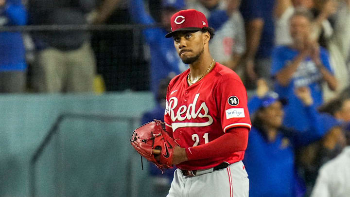 Cincinnati Reds starting pitcher Hunter Greene (21) reacts on the mound after giving up his third home run of the game in the third inning of the MLB National League Wild Card Game 1 between the Los Angeles Dodgers and the Cincinnati Reds at Dodger Stadium in Los Angeles on Tuesday, Sept. 30, 2025. The Dodgers won game 1 of the series, 10-5. Cincinnati Reds starting pitcher Hunter Greene (21) reacts on the mound after giving up his third home run of the game in the third inning of the MLB National League Wild Card Game 1 between the Los Angeles Dodgers and the Cincinnati Reds at Dodger Stadium in Los Angeles on Tuesday, Sept. 30, 2025. The Dodgers won game 1 of the series, 10-5.